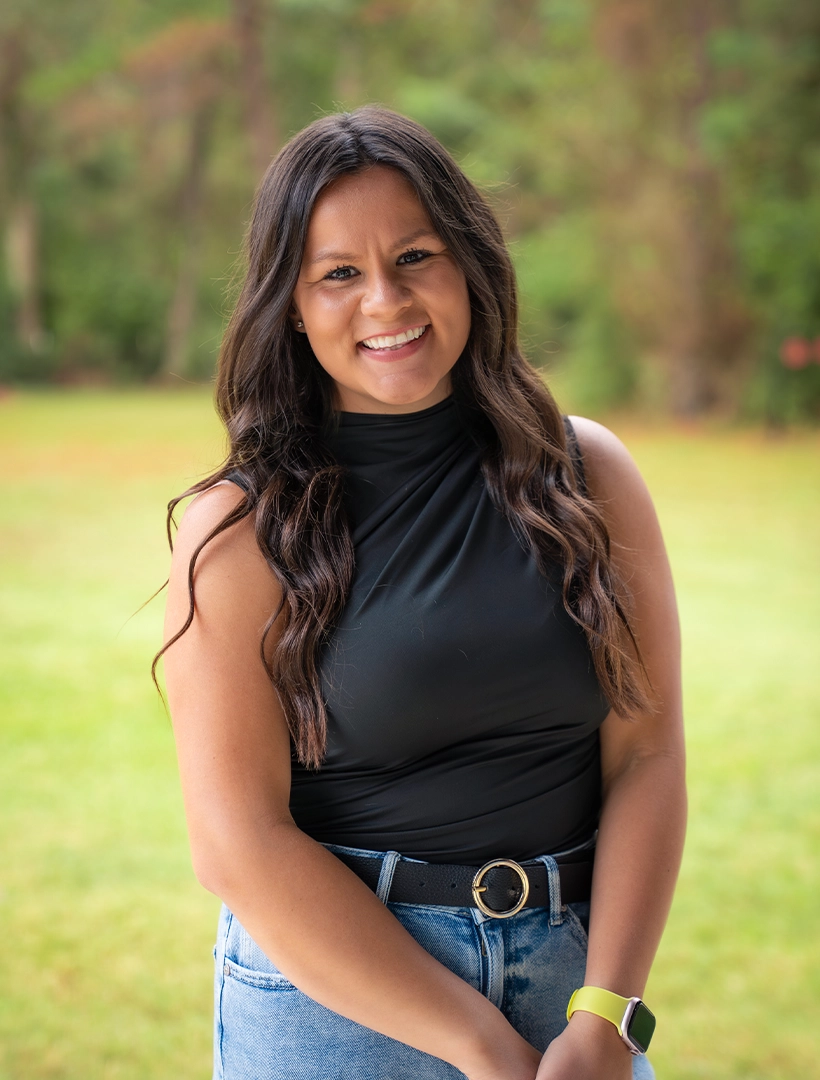 Portrait of the company founder smiling outdoors, representing the leadership behind the brand.