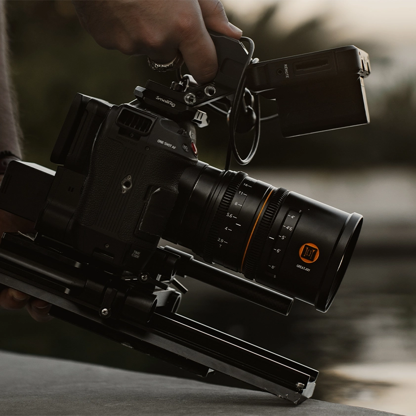 Professional video production camera with cinema lens and stabilizer rig, showcasing filmmaking, cinematography, and commercial content creation equipment.