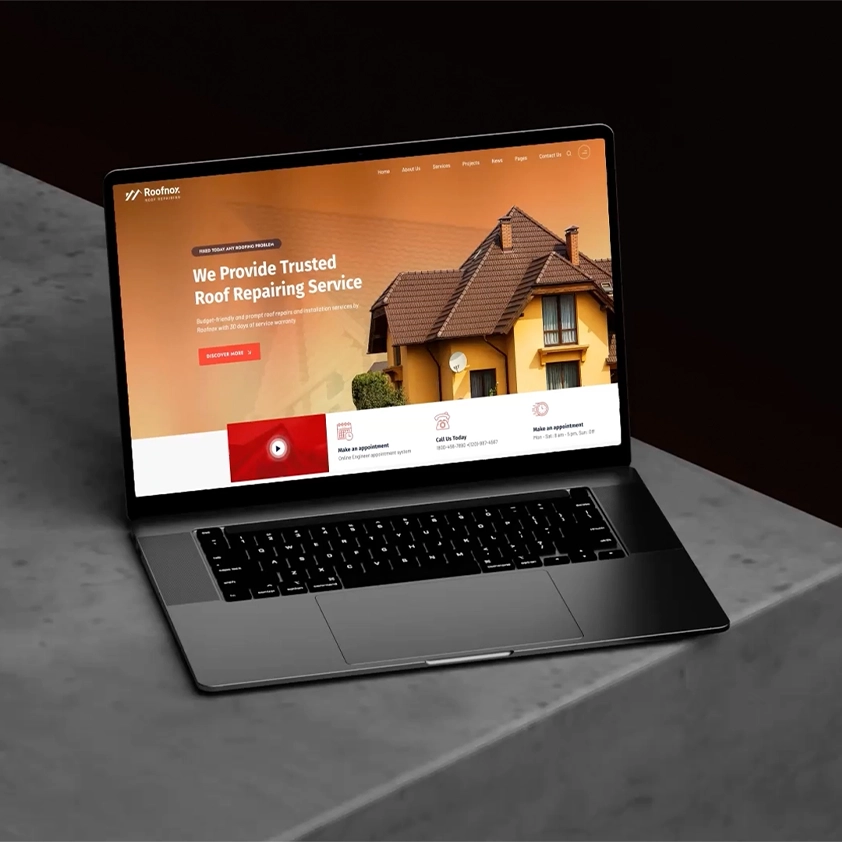 Laptop displaying a roofing company website homepage with roof repair services, contact options, and a modern layout, shown as a professional business web design mockup.